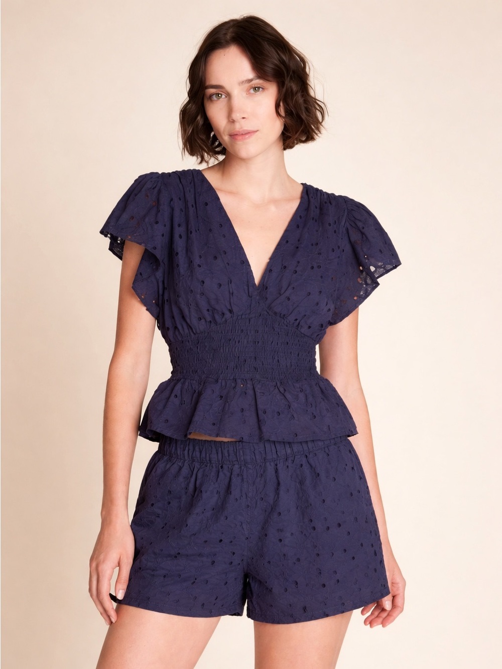 Anthropologie Navy Eyelet Peplum Top